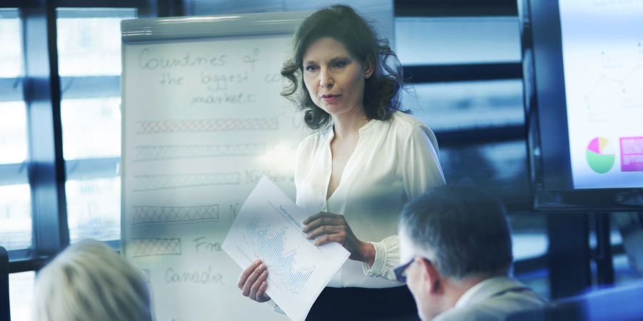 Woman presenting at event
