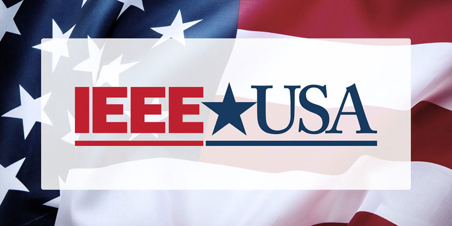 US Flag with IEEE-USA logo in front of it.